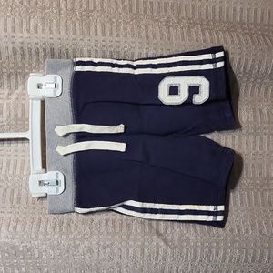 Navy blue sweats shorts, athletic.